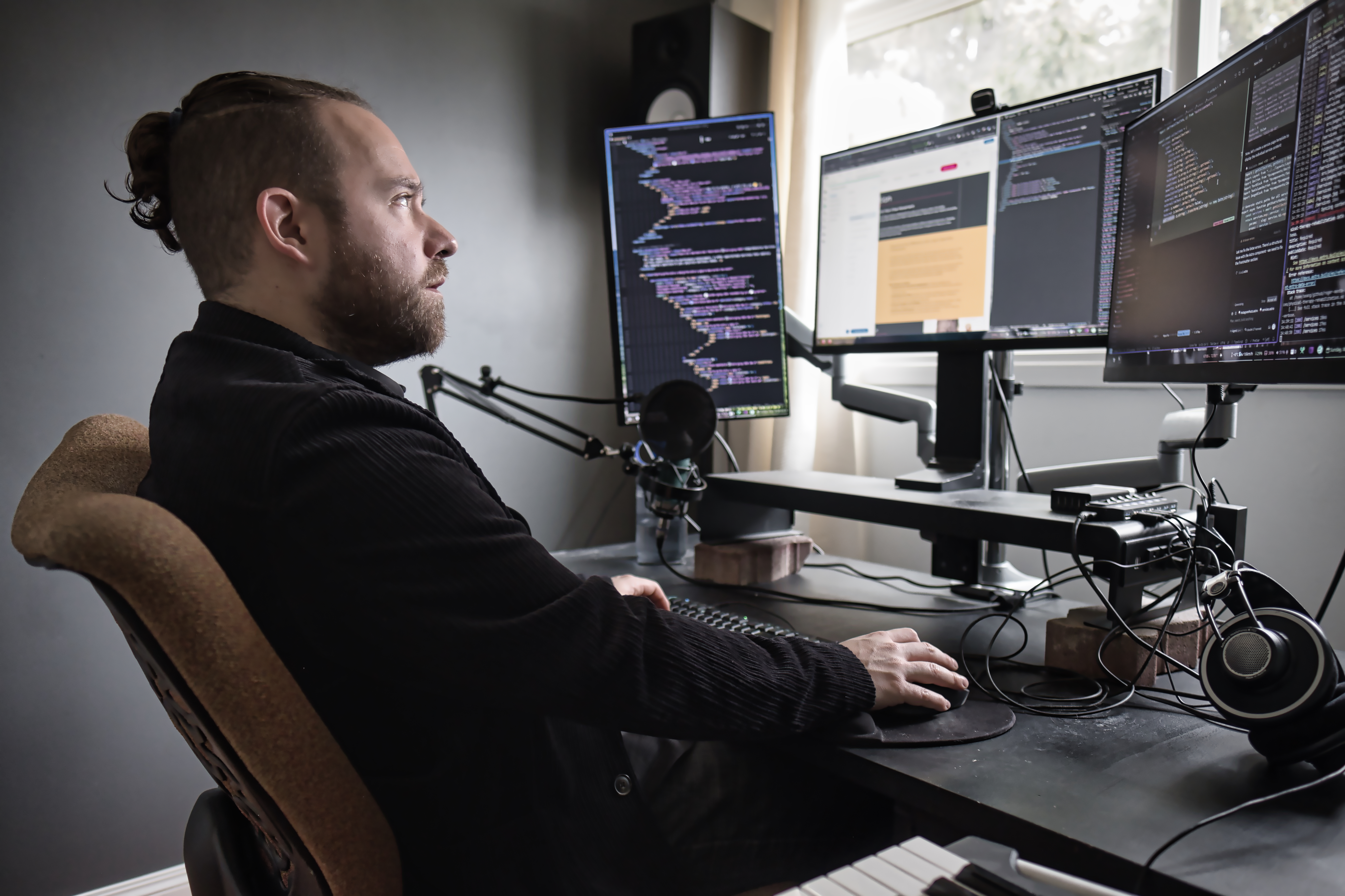 Sean working leaning back